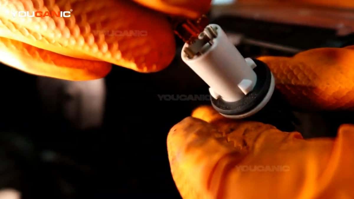 Installing The New Clearance Light Bulb. 1 - Replace Front Parking Clearance Light Bulb Honda Fit 2007-2013
