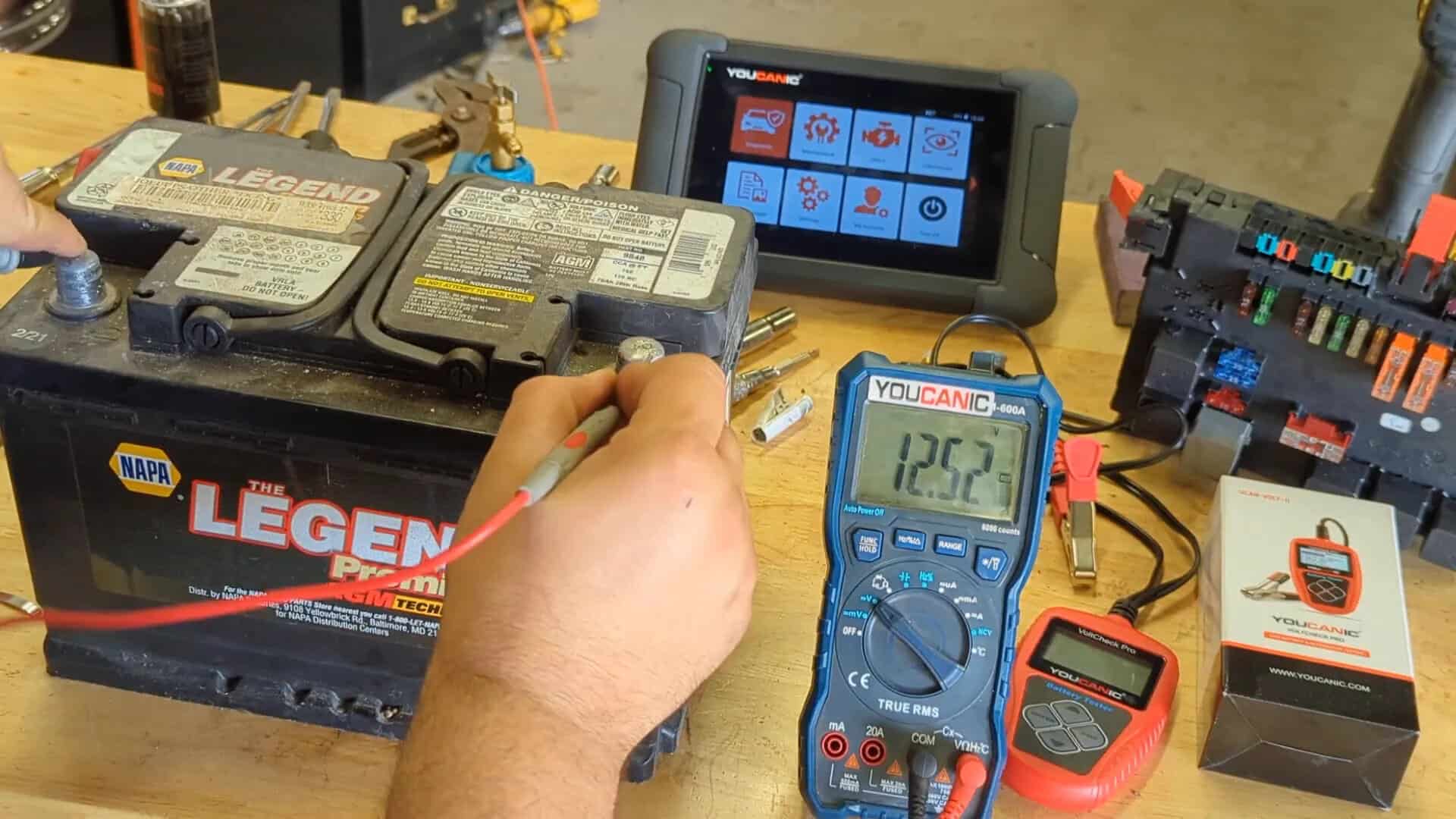 Car Battery Connected To Voltmeter Showing 12.5 Volts